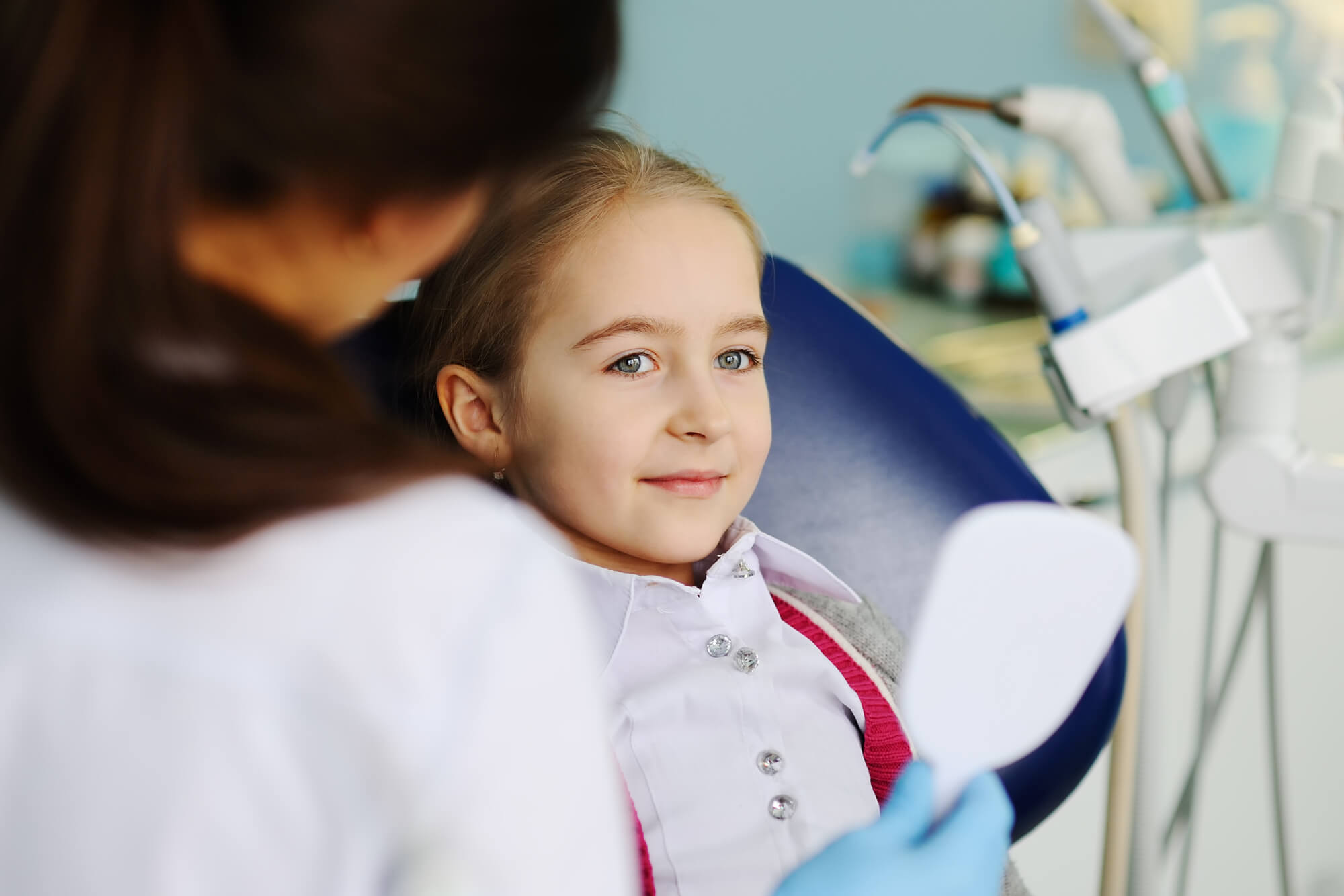 little girl smiling at the pediatric dentist in Coral Gables