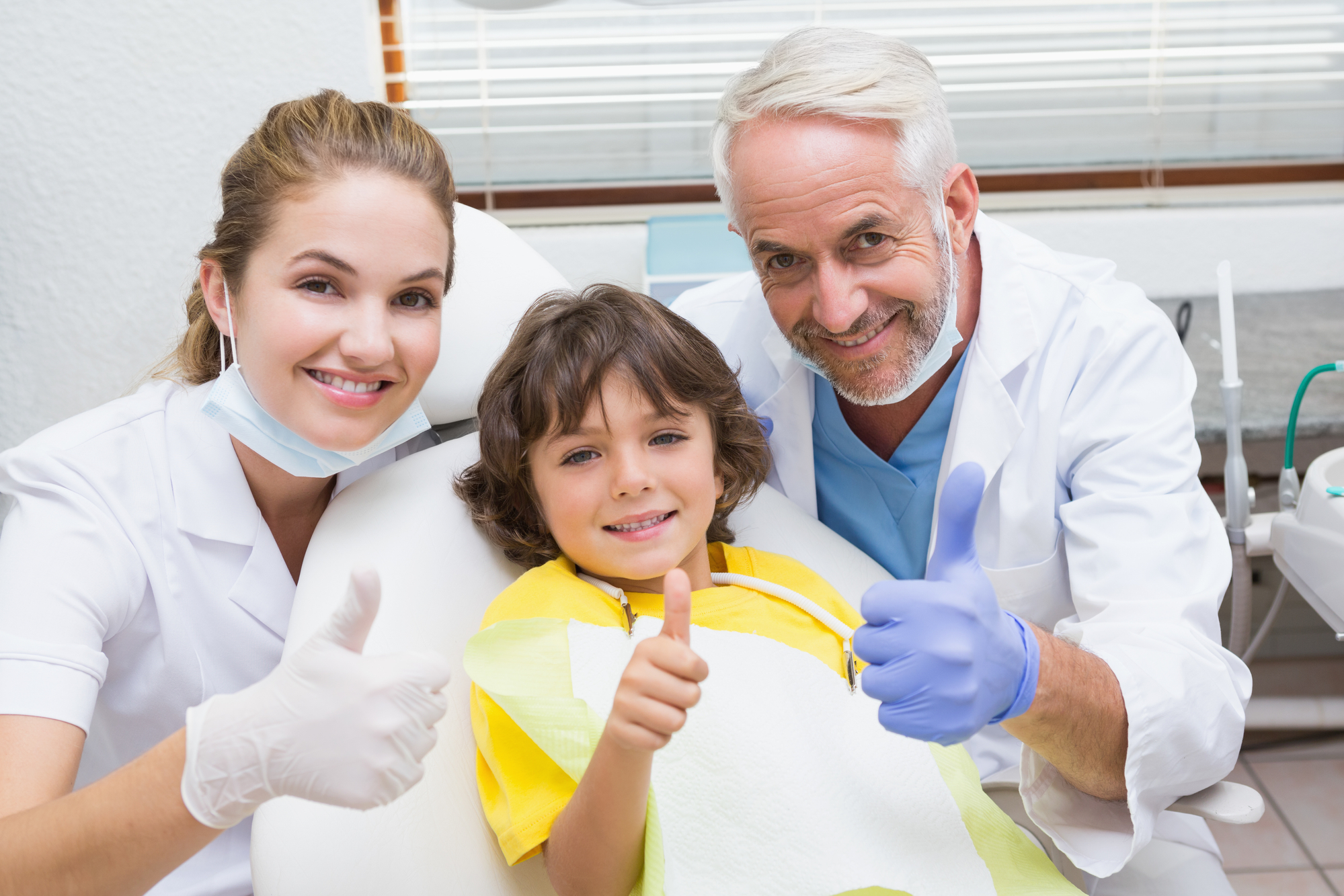 little boy showing thumbs up after an Infant Dental Exams Coral Gables