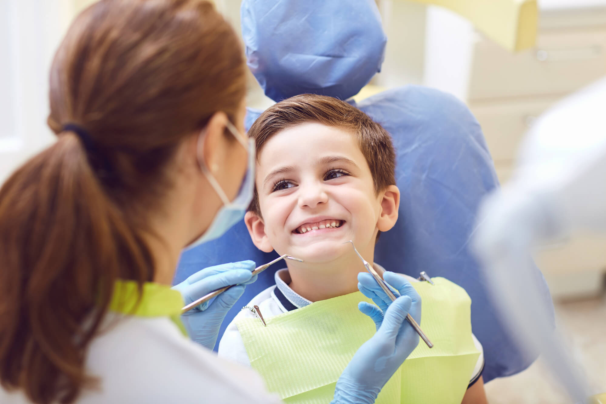 boy smiling after a Pulpotomy Coral Gables